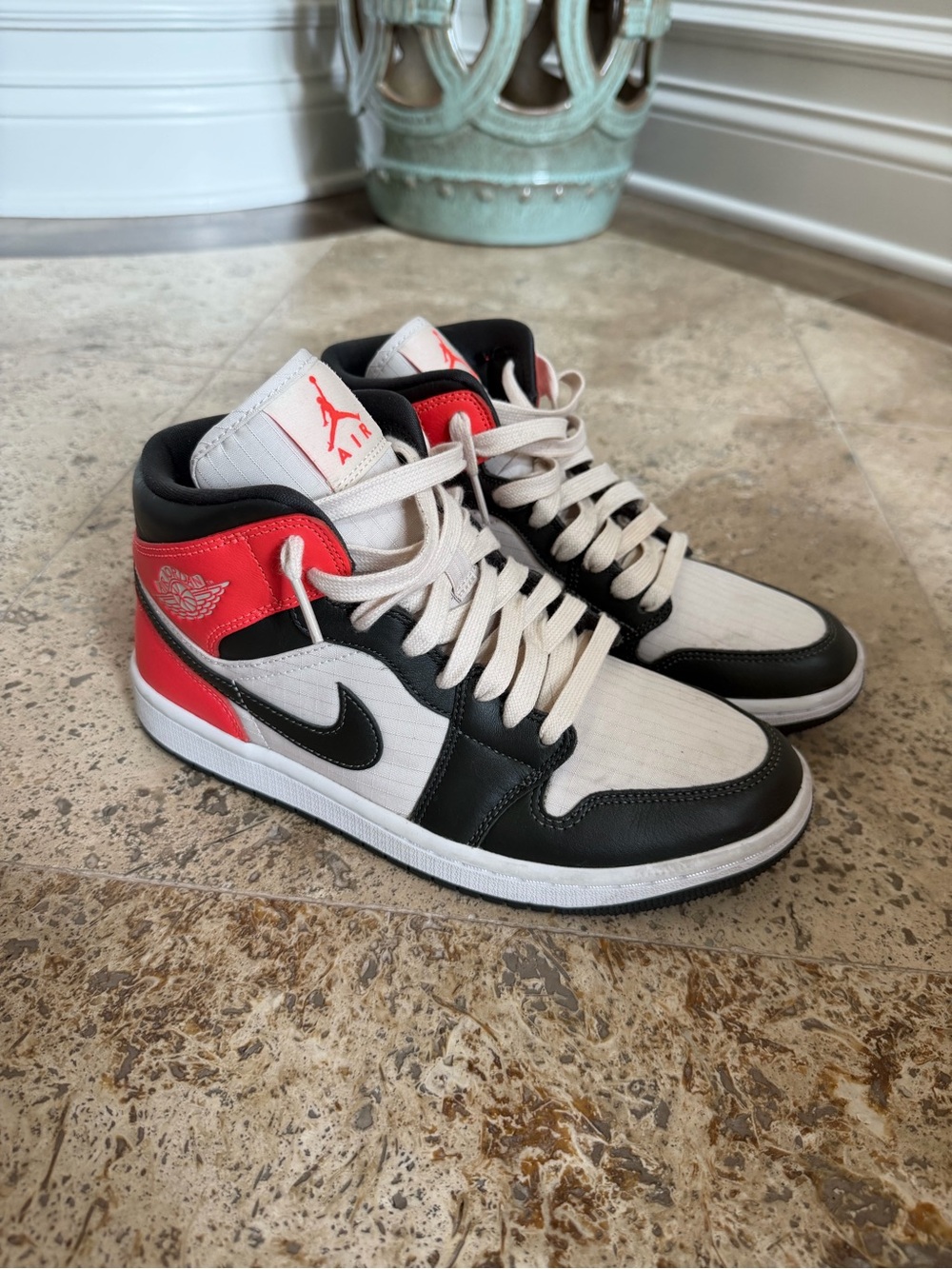 Jordan women’s High-Top Sneakers in Black, White & Red Accent